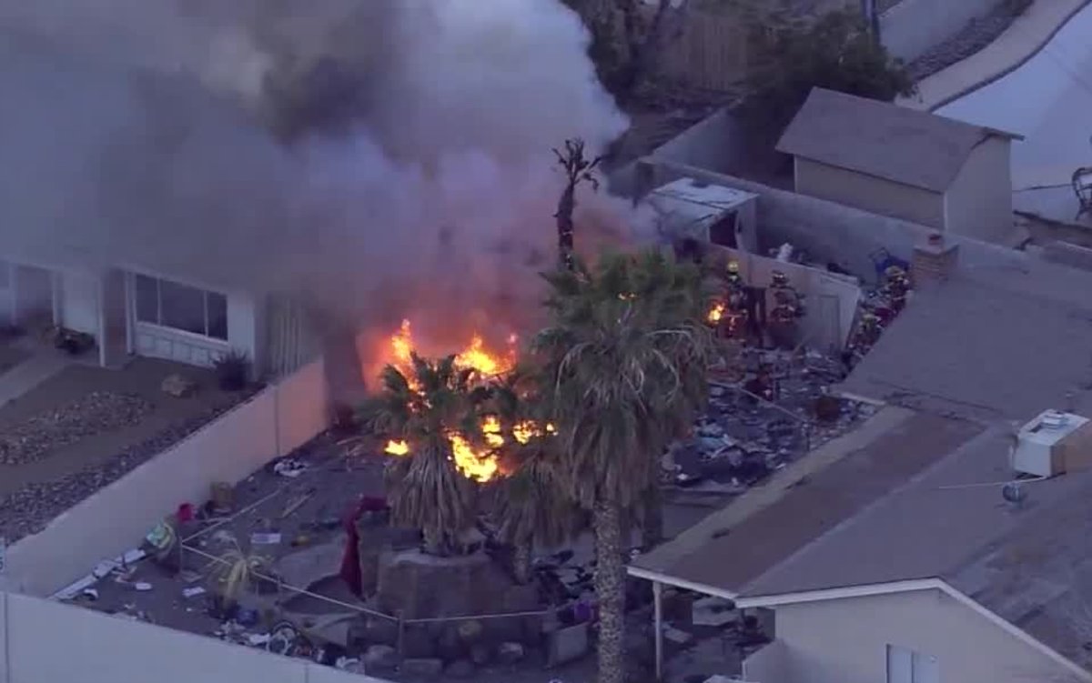 Firefighters tackled flames in the yard of a home near Sahara Avenue and Lindell Road, near Decatur Boulevard. Chopper 13 saw flames coming from a shed and scattered debris in the yard