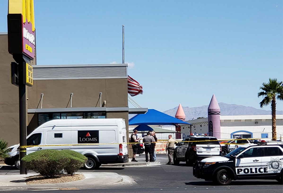 Two armed suspects are at large after robbing an armored truck near Tropicana and Jones this morning 
