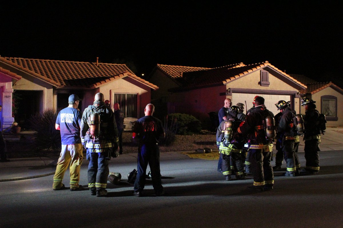 North Las Vegas firefighters responding to a home near Washburn and Commerce. Two firefighters carried a cat and small dog out of the house, unclear if residents were injured