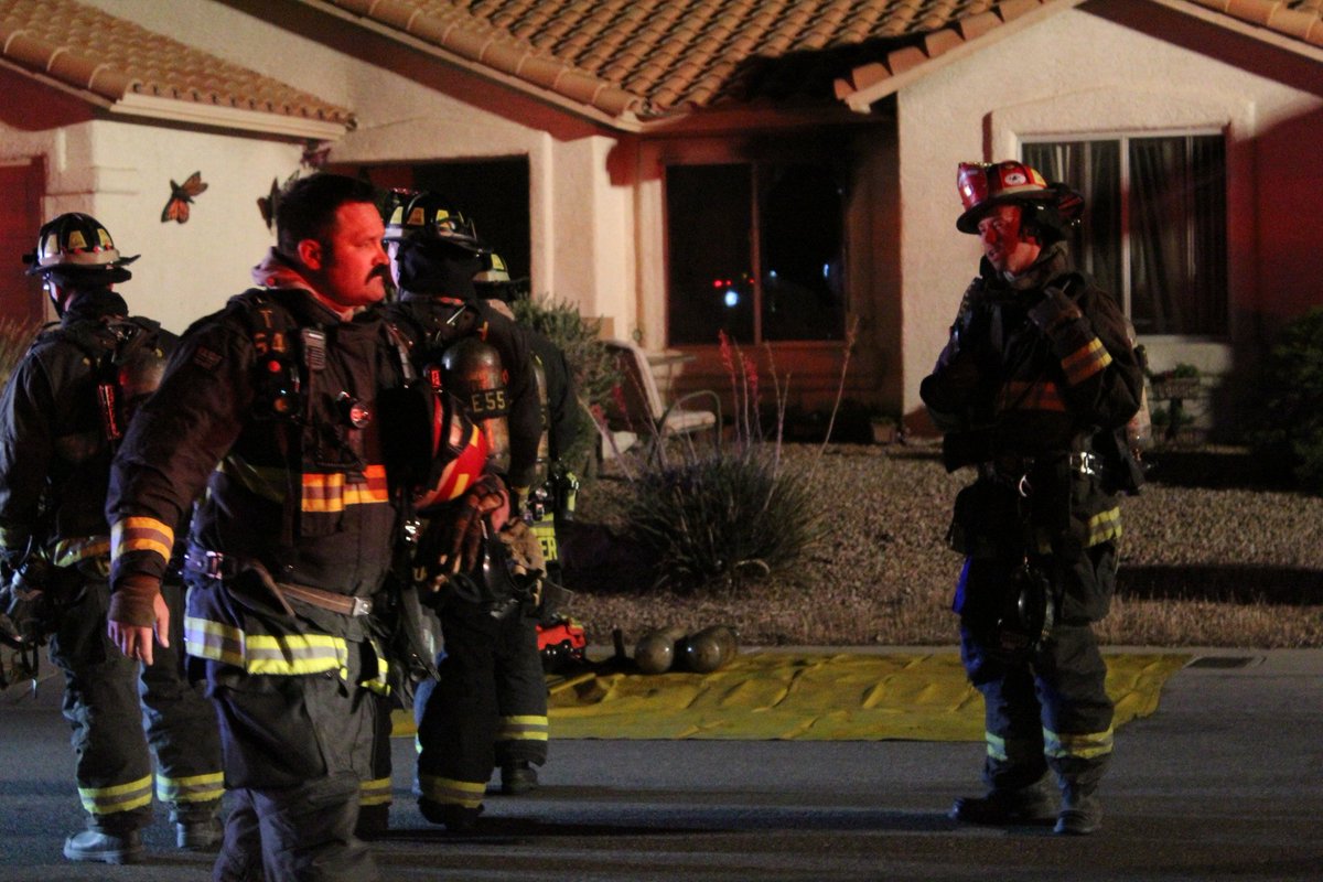 North Las Vegas firefighters responding to a home near Washburn and Commerce. Two firefighters carried a cat and small dog out of the house, unclear if residents were injured