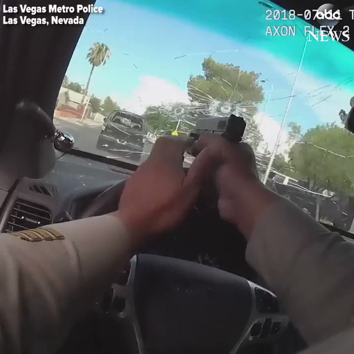 Bodycam footage captures police in Las Vegas exchanging gunfire with shooting suspects during a pursuit.   One of the suspects was killed after he tried to flee on foot, authorities say. The other was wounded and taken into custody.    