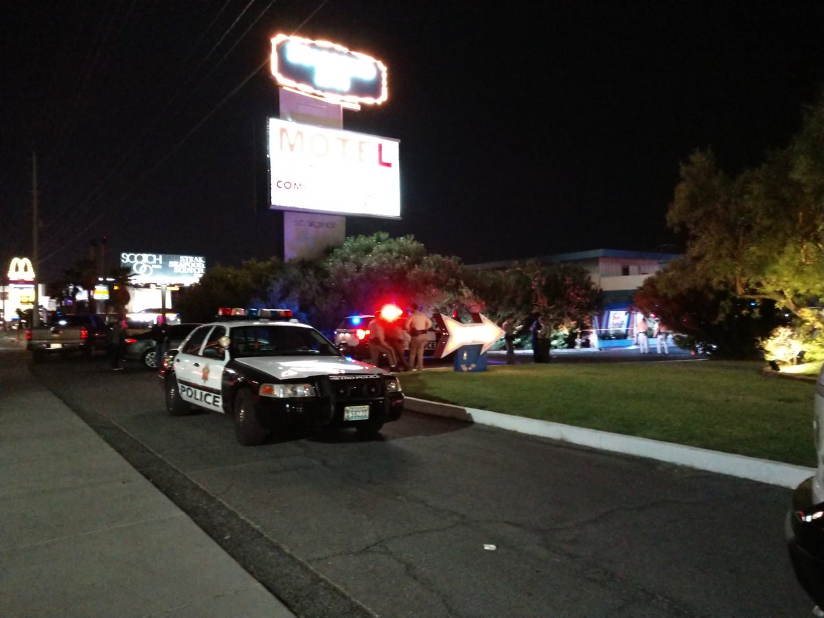 Metro officers and detectives are blocking off the parking lot to the Diamond Inn Motel on the boulevard south