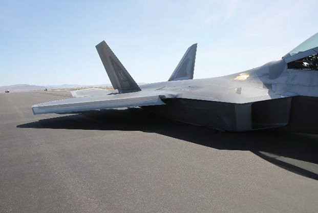 Premature Landing Gear Retraction Resulted In F-22 Raptor Sliding On Its Belly At NAS Fallon, Investigation Finds    