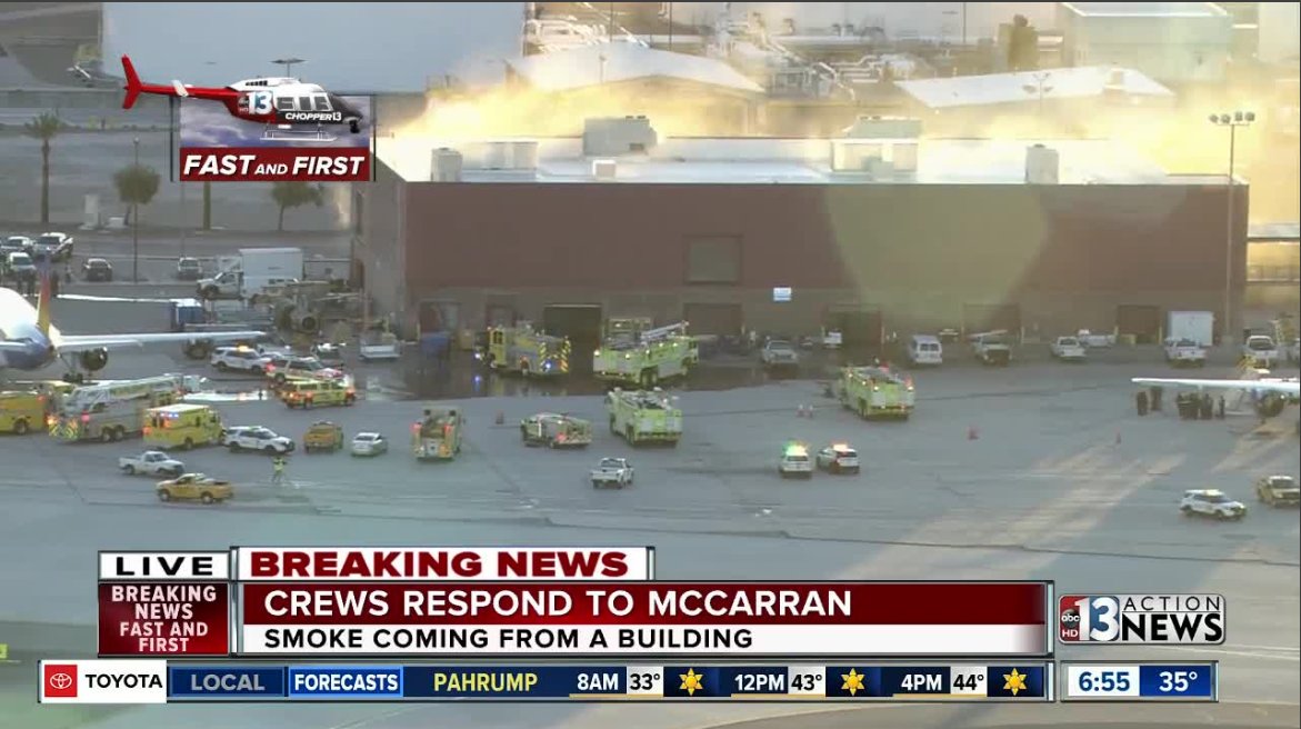 Clark County firefighters are checking out a possible fire and smoke in a building at McCarran International Airport.