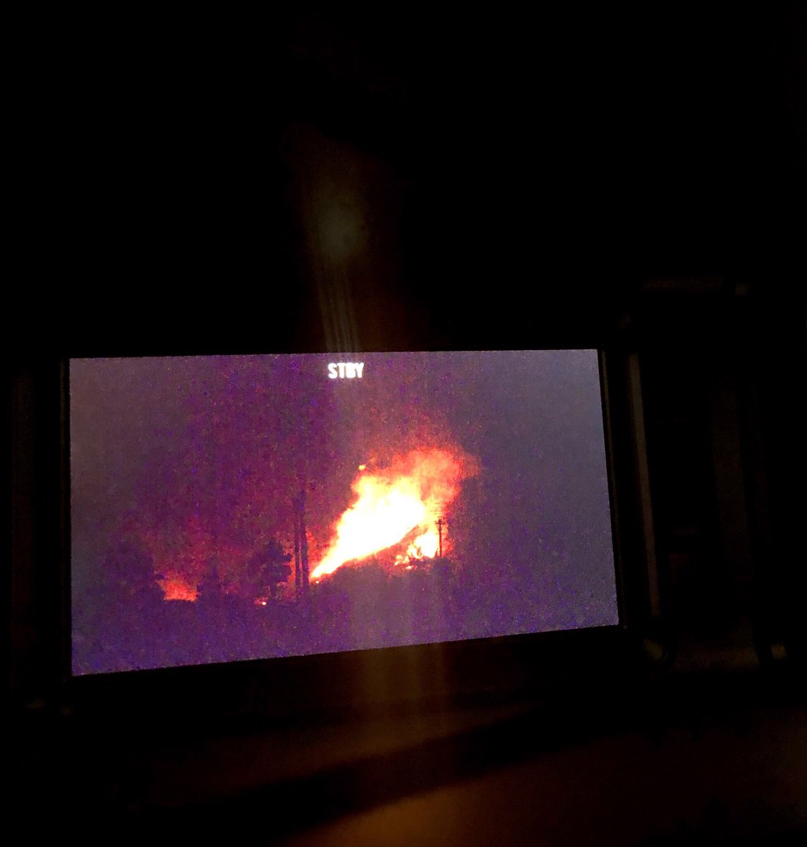 Is responding to a brush fire in Southwest Reno. No structures appear to be threatened at this time