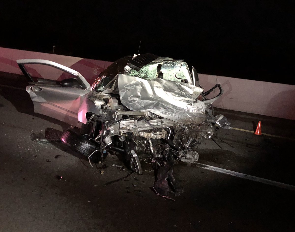 The silver car is the wrong-way driver and van in the desert is the right-way driver.  