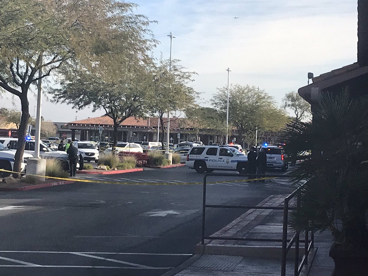 Scene of an officer-involved shooting near the intersection of Sunset Road and Green Valley Parkway in Henderson. The affected area is the Green Valley Plaza shopping center