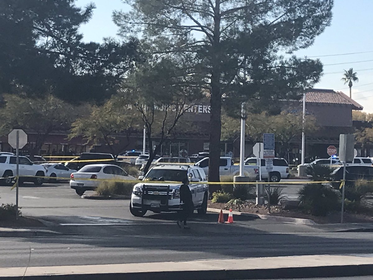 Scene of an officer-involved shooting near the intersection of Sunset Road and Green Valley Parkway in Henderson. The affected area is the Green Valley Plaza shopping center