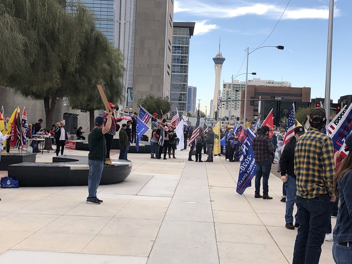 About 100 people outside here at the Foley Federal Building. Gates and security guards near entrance.  People say they are protesting the election results. Here's what some had to say about what's happening at the capitol: 1)a few condemned the violence while supporting the cause