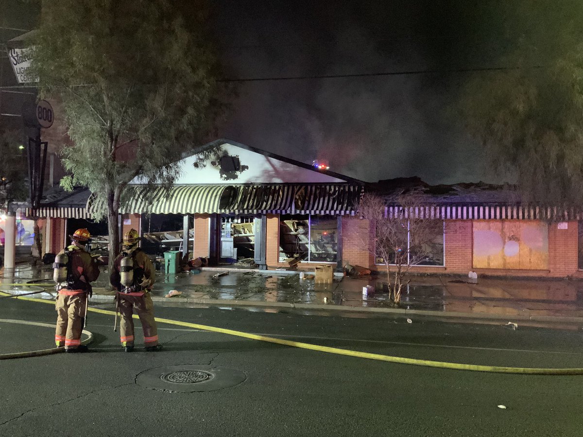 Fire is mostly OUT, hotspots remain, crews working on them. Cause U/I, no injuries, bldg completely destroyed, last large fire Jan 18, crews picking up, 800 E Sahara Ave Statewide Lighting Center, TOC:1:55pm, mostly @ClarkCountyFD on scene, this in @CityOfLasVegas