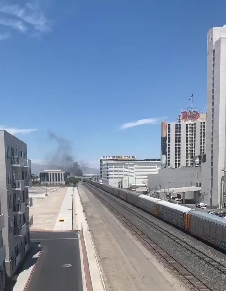 Heard a couple loud booms at home. Didn't think anything of it. Look outside 20 min later and turns out a train is on fire in downtown Las Vegas