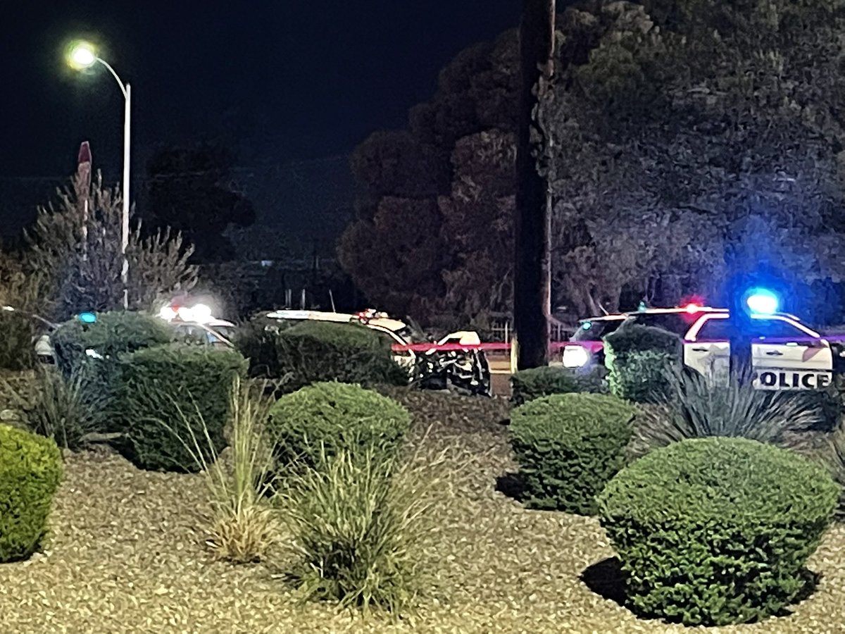 Suspect in custody following robbery, officer involved shooting, pursuit and crash. Here at the crash scene we see a white truck with its front end destroyed and a LVMPD vehicle front end also smashed in