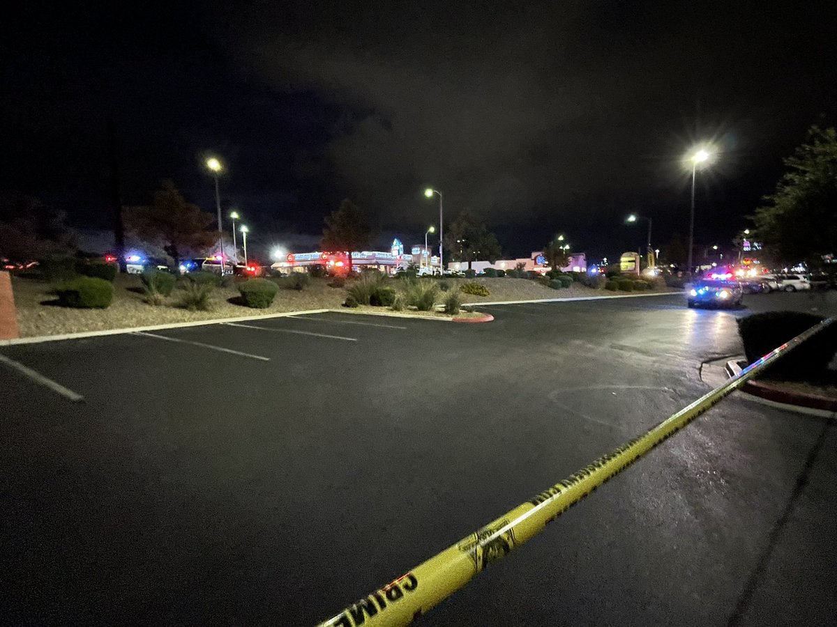 Suspect in custody following robbery, officer involved shooting, pursuit and crash. Here at the crash scene we see a white truck with its front end destroyed and a LVMPD vehicle front end also smashed in