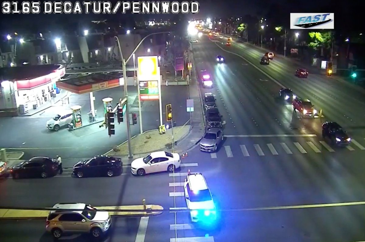 Police search for gunman who ran off after shooting a man near Decatur Boulevard and Pennwood Avenue.